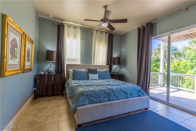 tiled bedroom featuring ceiling fan and access to outside