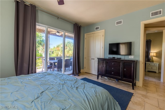 bedroom with ceiling fan, a closet, and access to outside