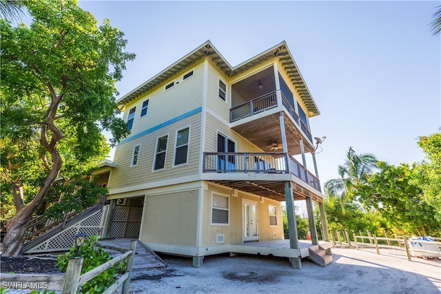 back of house with a balcony