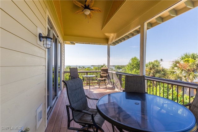 exterior space featuring ceiling fan