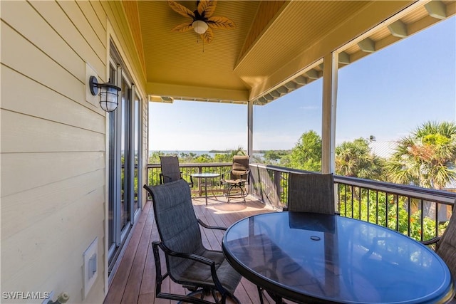 331 Spanish Gold Ln, Upper Captiva, FL 33924 - wooden terrace featuring ceiling fan and outdoor dining space