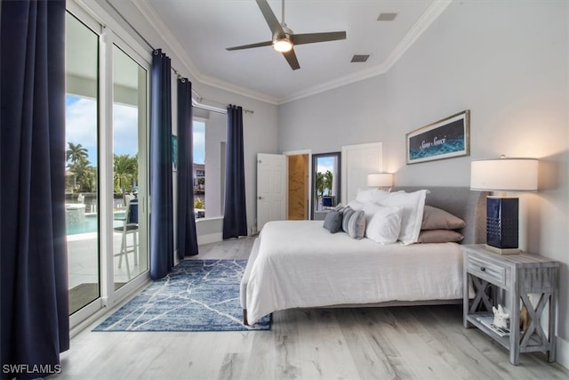 bedroom featuring crown molding, hardwood / wood-style flooring, access to exterior, and ceiling fan