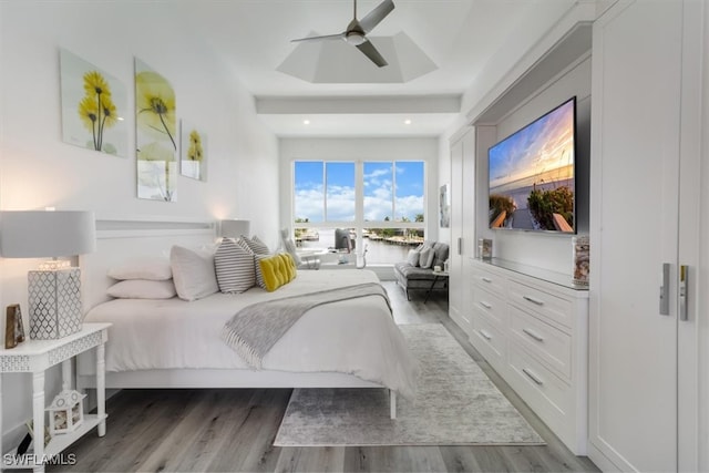 bedroom featuring dark wood-type flooring and ceiling fan