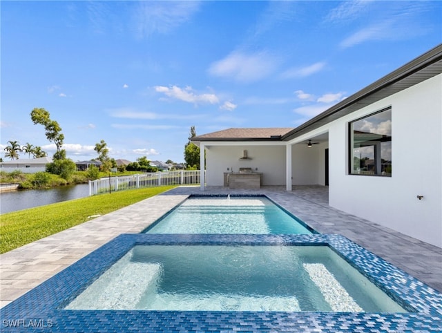 view of swimming pool featuring a water view, ceiling fan, a patio, and an in ground hot tub