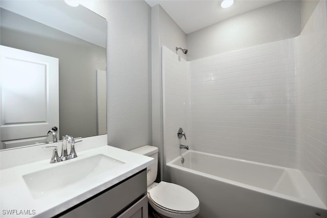 full bathroom featuring toilet, vanity, and shower / washtub combination