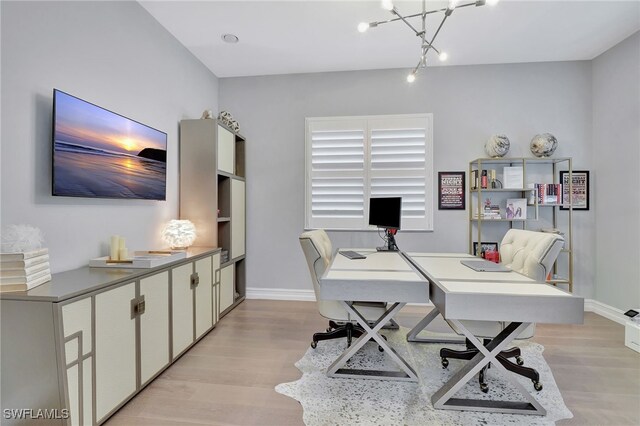 14690 Reserve Pl, Naples, FL 34109 - office area featuring light wood-style flooring and baseboards