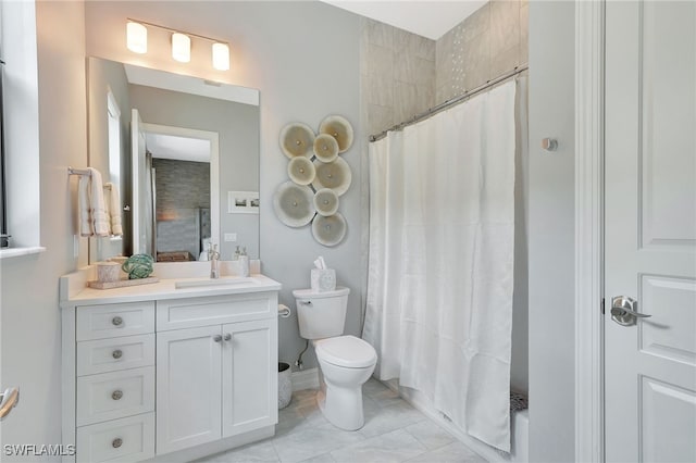 14690 Reserve Pl, Naples, FL 34109 - full bath featuring vanity, a shower with shower curtain, toilet, and tile patterned floors