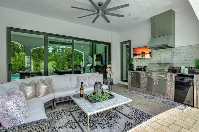 14690 Reserve Pl, Naples, FL 34109 - living area with ceiling fan and a textured ceiling