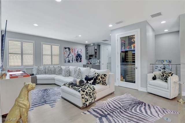 14690 Reserve Pl, Naples, FL 34109 - living room with wood finished floors and recessed lighting