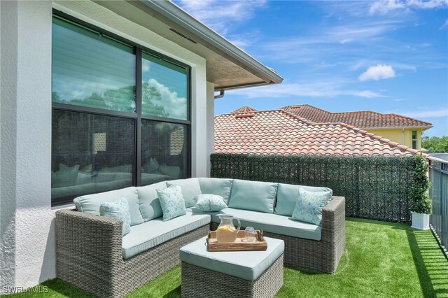 14690 Reserve Pl, Naples, FL 34109 - view of patio / terrace with an outdoor living space and a balcony
