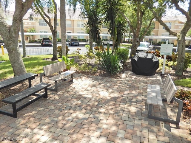 view of property's community featuring a patio