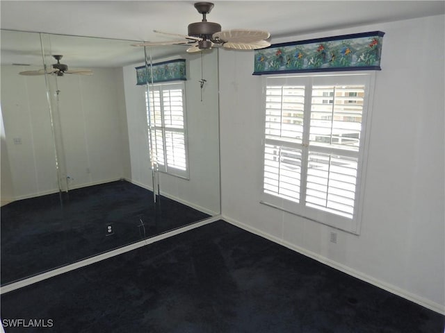 interior space featuring ceiling fan