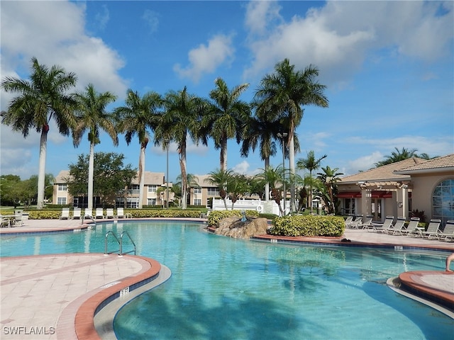 view of swimming pool featuring a patio area