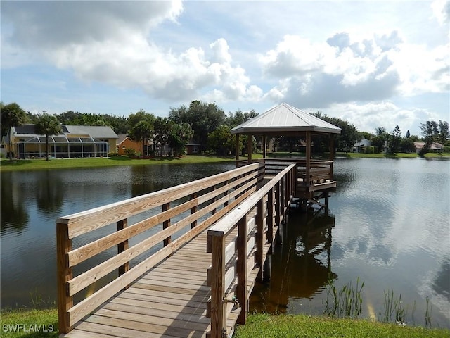 dock area featuring a gazebo and a water view