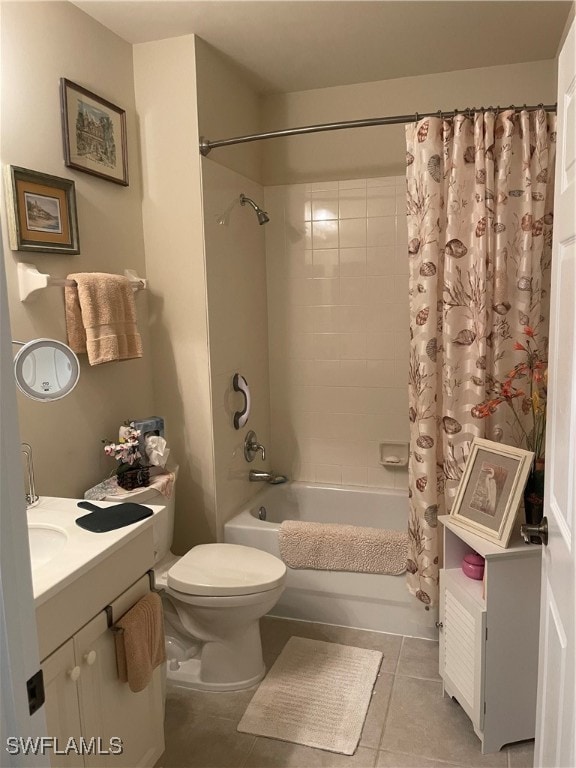 full bathroom with shower / bath combo, tile patterned flooring, toilet, and vanity