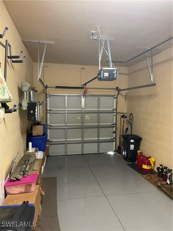 garage featuring a garage door opener