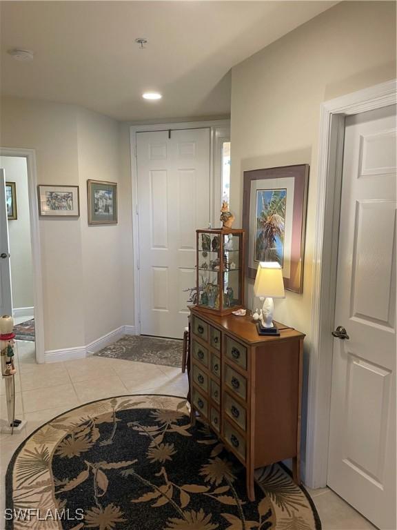 interior space featuring light tile patterned floors