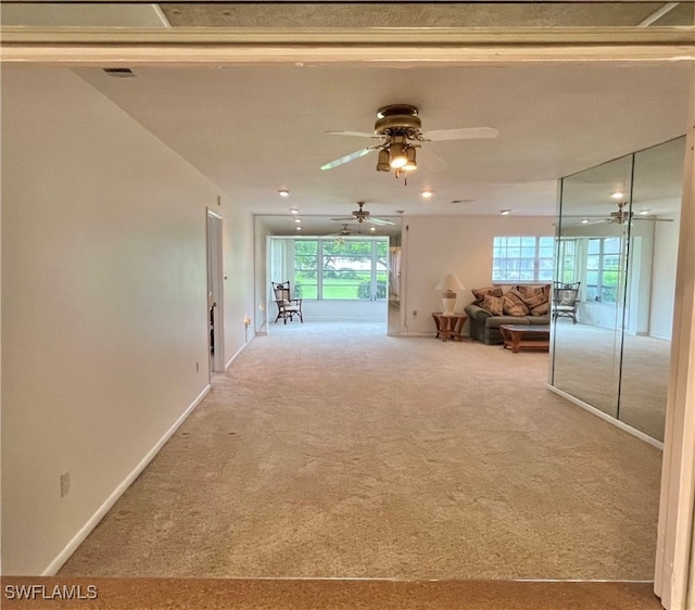 hallway featuring carpet flooring