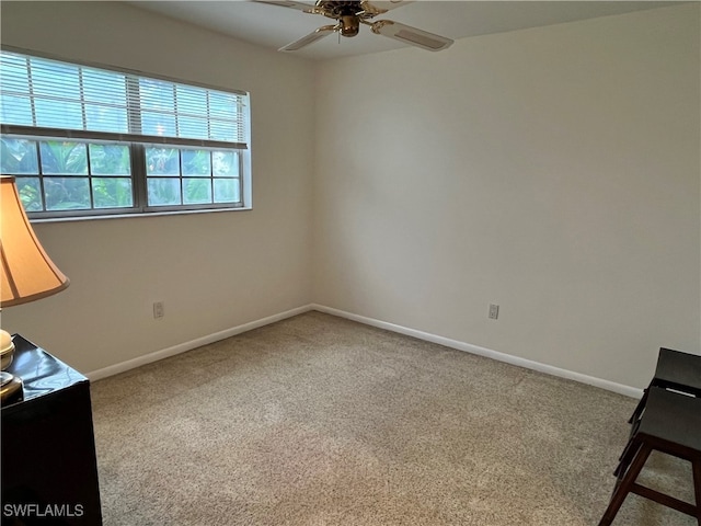 unfurnished room with carpet floors and ceiling fan