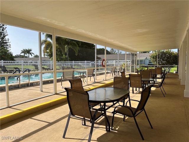 view of patio with a community pool