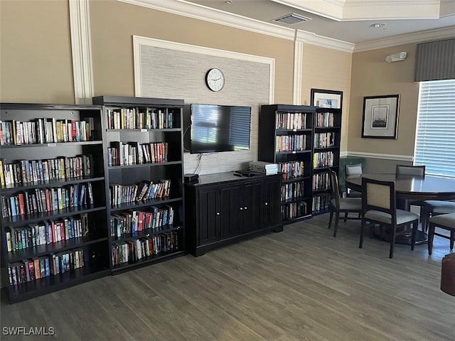 office area with ornamental molding and hardwood / wood-style floors