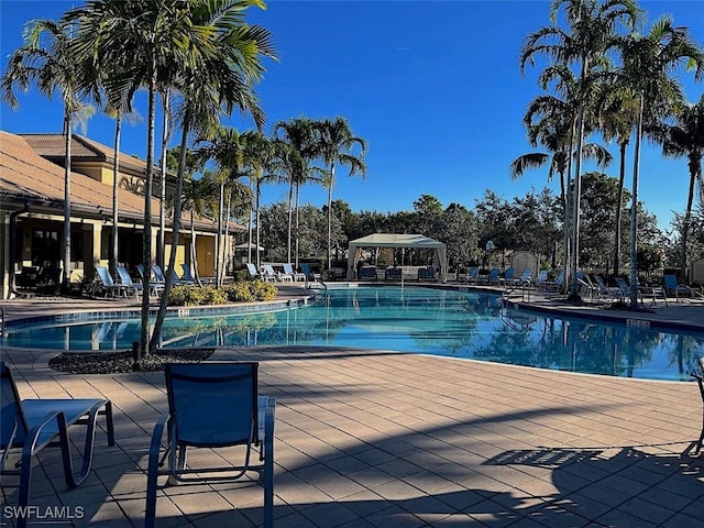 view of pool featuring a gazebo and a patio area