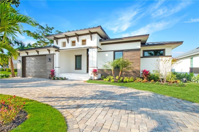 view of front of home with a garage