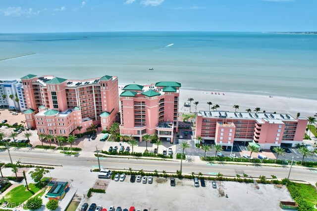 aerial view featuring a beach view and a water view