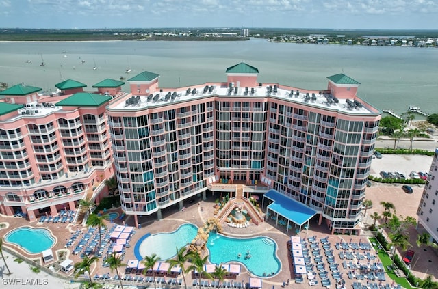 birds eye view of property featuring a water view