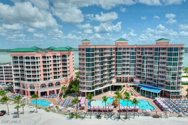 view of property featuring a community pool