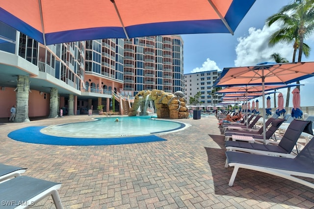 view of pool featuring pool water feature