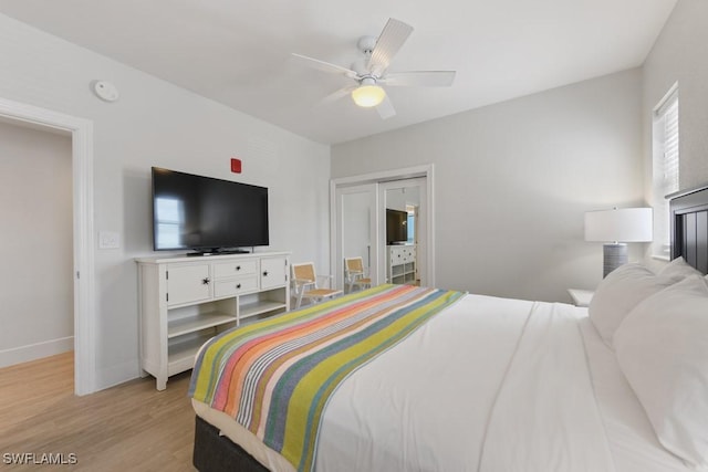 200 Estero Blvd Unit 101, Fort Myers Beach, FL 33931 - bedroom featuring a ceiling fan, baseboards, and light wood finished floors