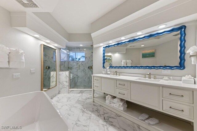 bathroom featuring lofted ceiling, independent shower and bath, and vanity