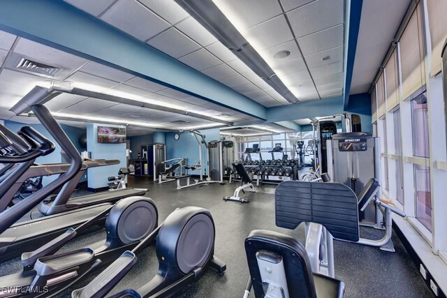 gym with a drop ceiling