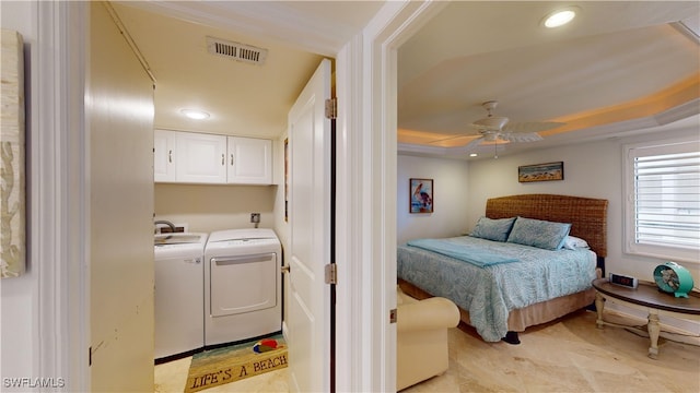 bedroom with ceiling fan and washer and clothes dryer