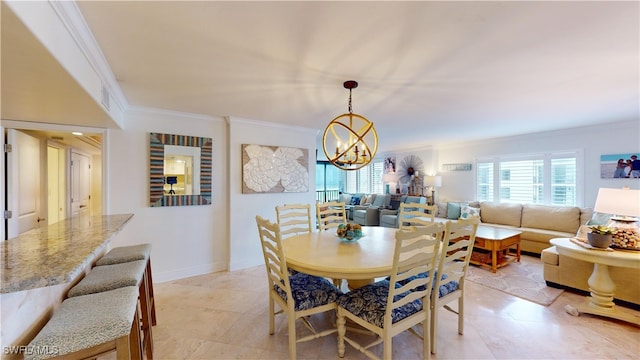 dining room with a notable chandelier and crown molding