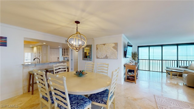 dining room featuring expansive windows, crown molding, and a notable chandelier