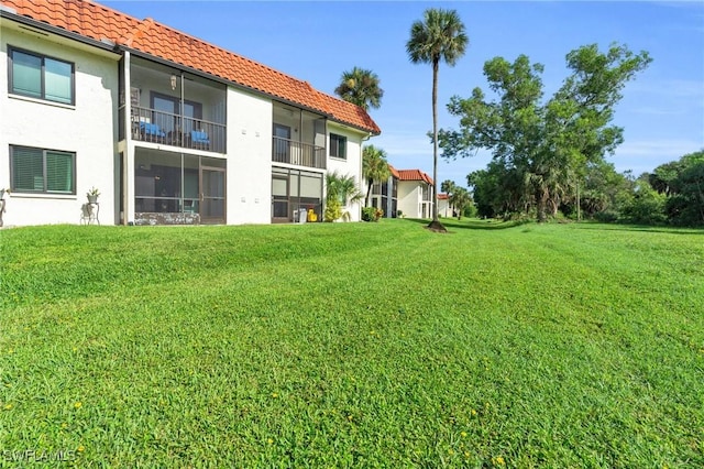 4318 27th Ct SW Unit 102, Naples, FL 34116 - view of grassy yard