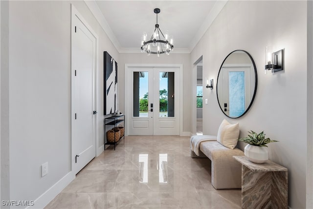 entryway featuring a chandelier, french doors, and ornamental molding