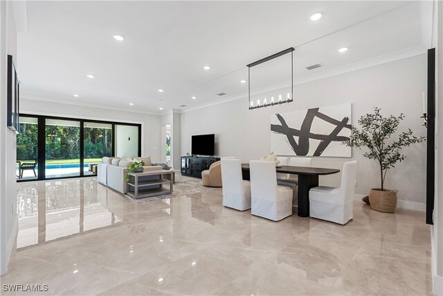 living room featuring crown molding