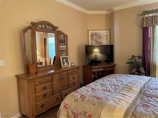 bedroom with crown molding