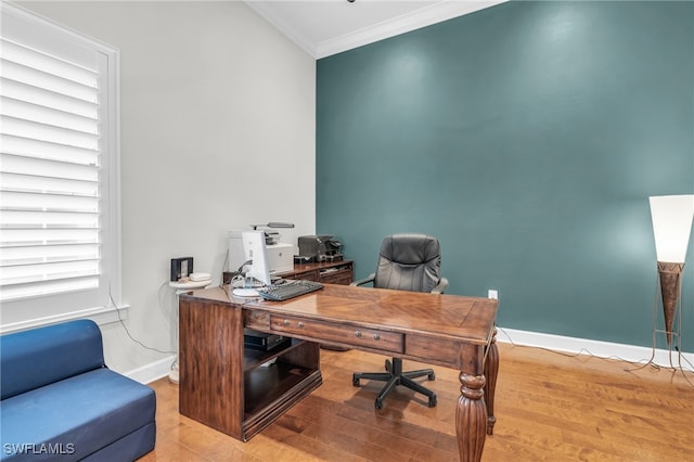 office area featuring crown molding and light hardwood / wood-style flooring