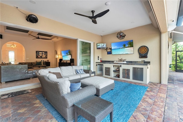 living room with ceiling fan