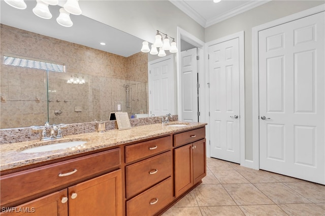 bathroom featuring walk in shower, vanity, tile patterned floors, and ornamental molding