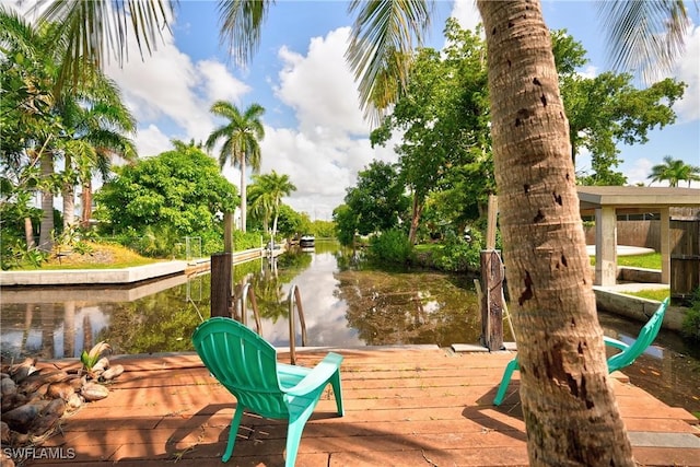 view of community with a water view