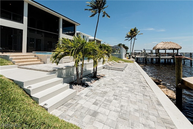 dock area with a water view