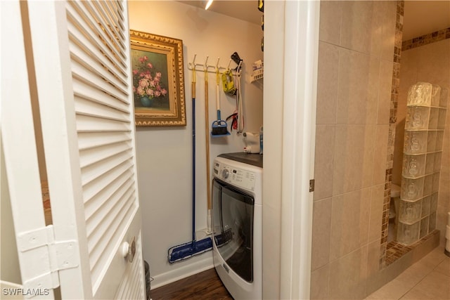 laundry area featuring washer / dryer and hardwood / wood-style floors