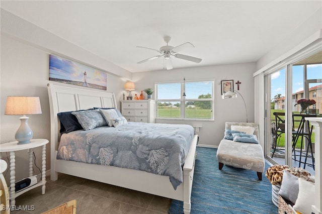 tiled bedroom with access to exterior and ceiling fan