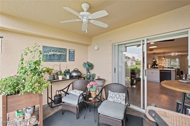 view of patio featuring ceiling fan