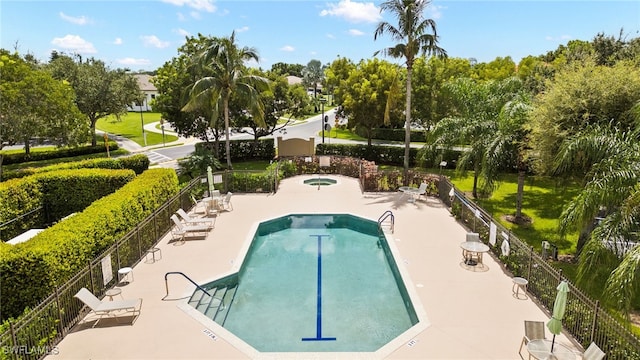 view of pool featuring a patio area